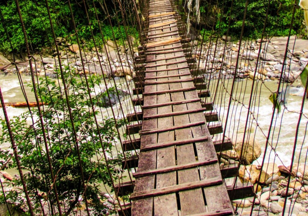 Old suspension bridge Annapurna Nepal By Mountain People